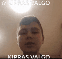 a picture of a boy with the words kiprus valgo on the top