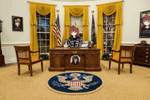 a girl with a crown sits at a desk in a white house