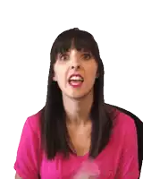 a woman in a pink shirt is making a funny face with her mouth open