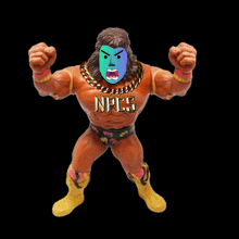 a toy wrestler with a necklace that says npcs on it