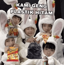 a group of people dressed in bunny costumes are holding a bag of cheetos