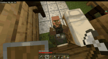 a screenshot of a minecraft game shows a villager with a green eye