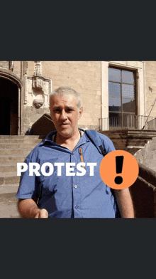 a man in a blue shirt is standing in front of a building with protest written on the bottom