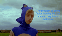 a boy in a sonic costume with a quote about being faster than light