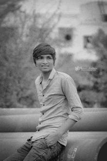 a black and white photo of a young man taken by rana siddhi