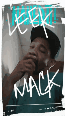 a man smoking a cigarette with the word mack on the bottom