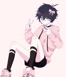 a drawing of a boy in a pink hoodie and black shorts giving a peace sign