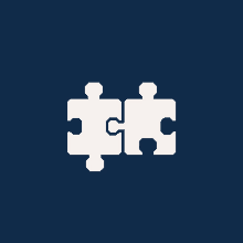 two white puzzle pieces are connected together on a dark blue background