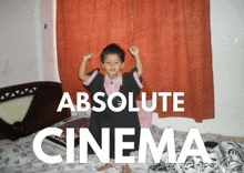 a little boy sitting on a bed with the words absolute cinema written above him