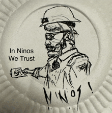 a paper plate with a drawing of a man and the words " in ninos we trust " on it