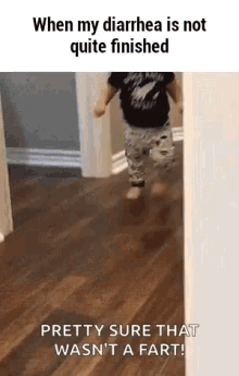 a baby is running down a hallway with the words `` pretty sure that wasn 't a fart '' written on it .