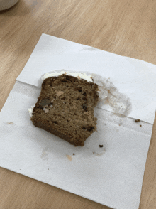 a slice of cake on a napkin that has been eaten