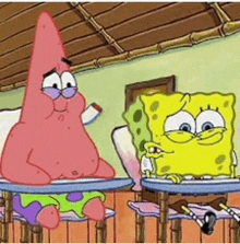 patrick star and spongebob are sitting at desks in a classroom