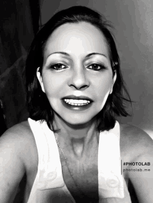 a black and white photo of a woman with #photolab me written below her