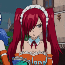 a girl with red hair is wearing a maid outfit and holding a book that says land