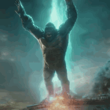 a giant gorilla is standing in front of a blue light coming from the sky