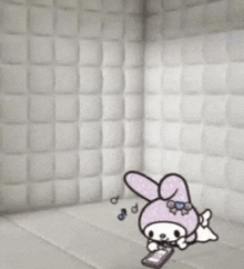 a cartoon of a bunny holding a cell phone in a room