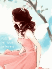 a girl in a pink dress and tiara is sitting under a tree