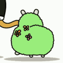 a cartoon of a green sheep with a flower on its head