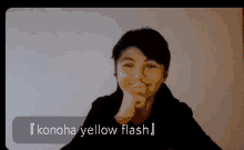 a video of a person with the words konoha yellow flash behind them