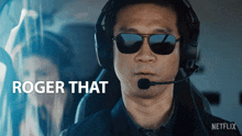 a man wearing headphones and sunglasses says " roger that " in a netflix ad