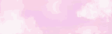 it looks like a pink and white background with a blurred effect .