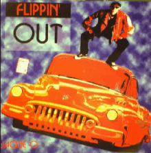 flippin ' out by jackie o features a man standing on top of a car