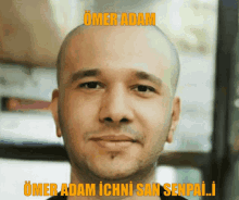 a close up of a man 's face with the words " omer adam ichni san senpai " above him