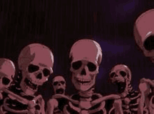 a group of skeletons are standing next to each other on a dark background .