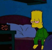 bart simpson is sitting on a bed in front of a digital clock .