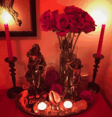 a tray with candles flowers and a chocolate bar that says " chocolat "