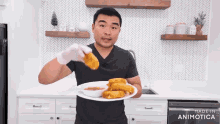 a man in a black shirt is holding a plate of food in front of a dishwasher that says made in animotica