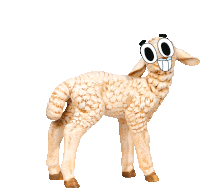 a figurine of a sheep with a cartoon face on it