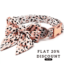 a dog collar with a bow and the words flat 20 % discount on the bottom