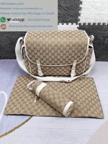 a gucci diaper bag with a changing mat and a bottle holder