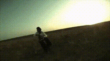 a person is riding a bike on a dirt road