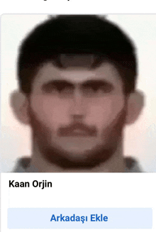 a picture of a man with the name kaan orjin next to it