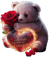 a teddy bear is holding a heart that says te amo con todo mi corazon