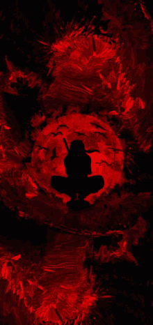 a silhouette of a person with a sword in front of a red moon