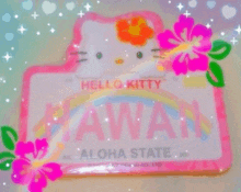 a hello kitty license plate with a rainbow and flowers on it .