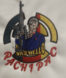 a patch with a man holding a gun and the word pachipa in red