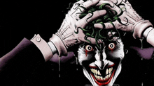 a close up of the joker 's face with a glove on his head