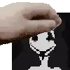 a hand is holding a piece of paper with a picture of a cartoon character on it .