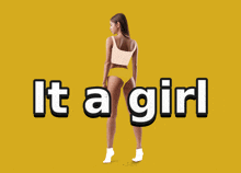 a woman stands in front of a yellow background with the words " it a girl "