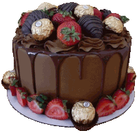 a chocolate cake with strawberries and chocolate covered ferrero rocher