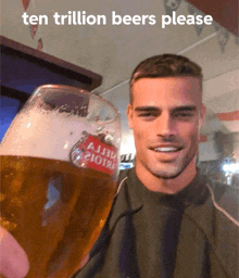 a man holding a glass of beer with the words ten trillion beers please written on the bottom