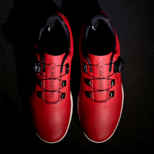 a pair of red shoes with the words to edge comfort written on them