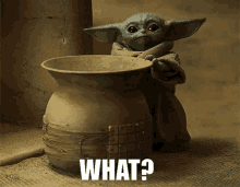 a baby yoda figurine is holding a clay pot and says what ?