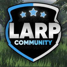 a logo for the larp community is shown on a grassy field