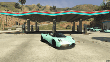 a car is parked in front of a gas station with a screenshot of a video game in the background